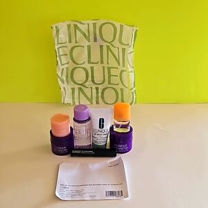 NWT Clinique gift set includes Happy .14 floz perfume spray, cleanser eye & face